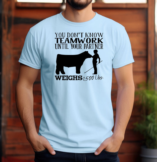 You (Male) Don't Know Teamwok Until Your (Beef) Partner Weighs 1,500 Lbs. Adult/Youth Unisex Cotton T-shirt | Cryin Creek