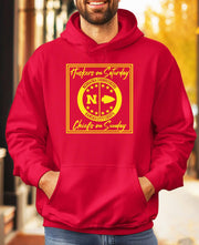 Man wearing a red and gold Huskers Chiefs hoodie sweatshirt.