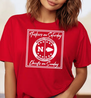 Woman wearing a red Huskers Chiefs t-shirt.