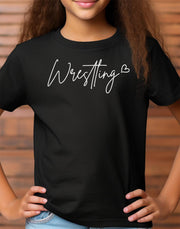 Child wearing a black Wrestling Love t-shirt.