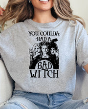 Woman wearing a sport grey You Coulda Had a Bad Witch t-shirt.