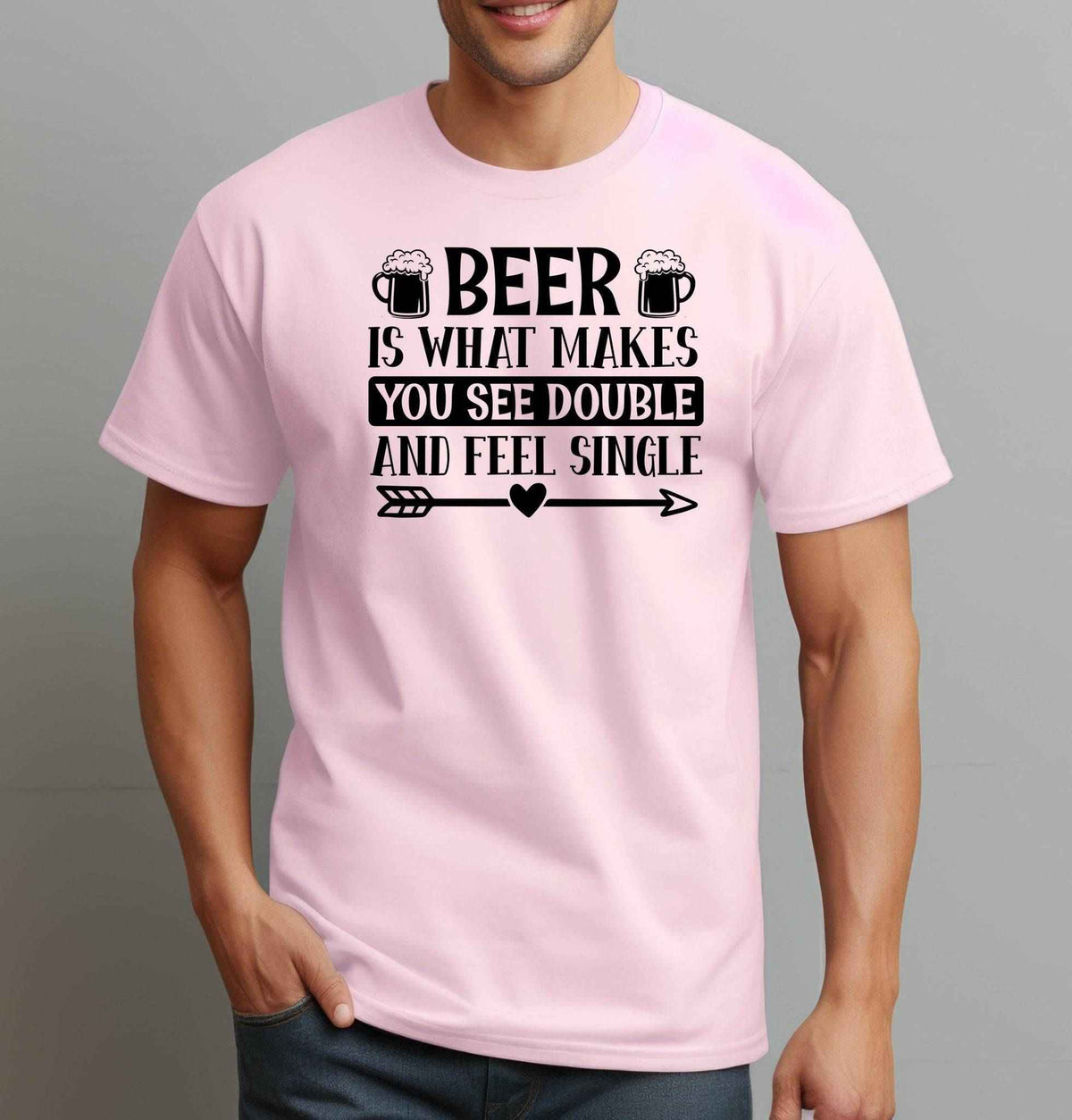 Man wearing a light pink graphic T Shirt with black lettering reading Beer Is What Makes You See Double and Feel Single, with beer mug illustrations.