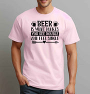 Man wearing a light pink graphic T Shirt with black lettering reading Beer Is What Makes You See Double and Feel Single, with beer mug illustrations.
