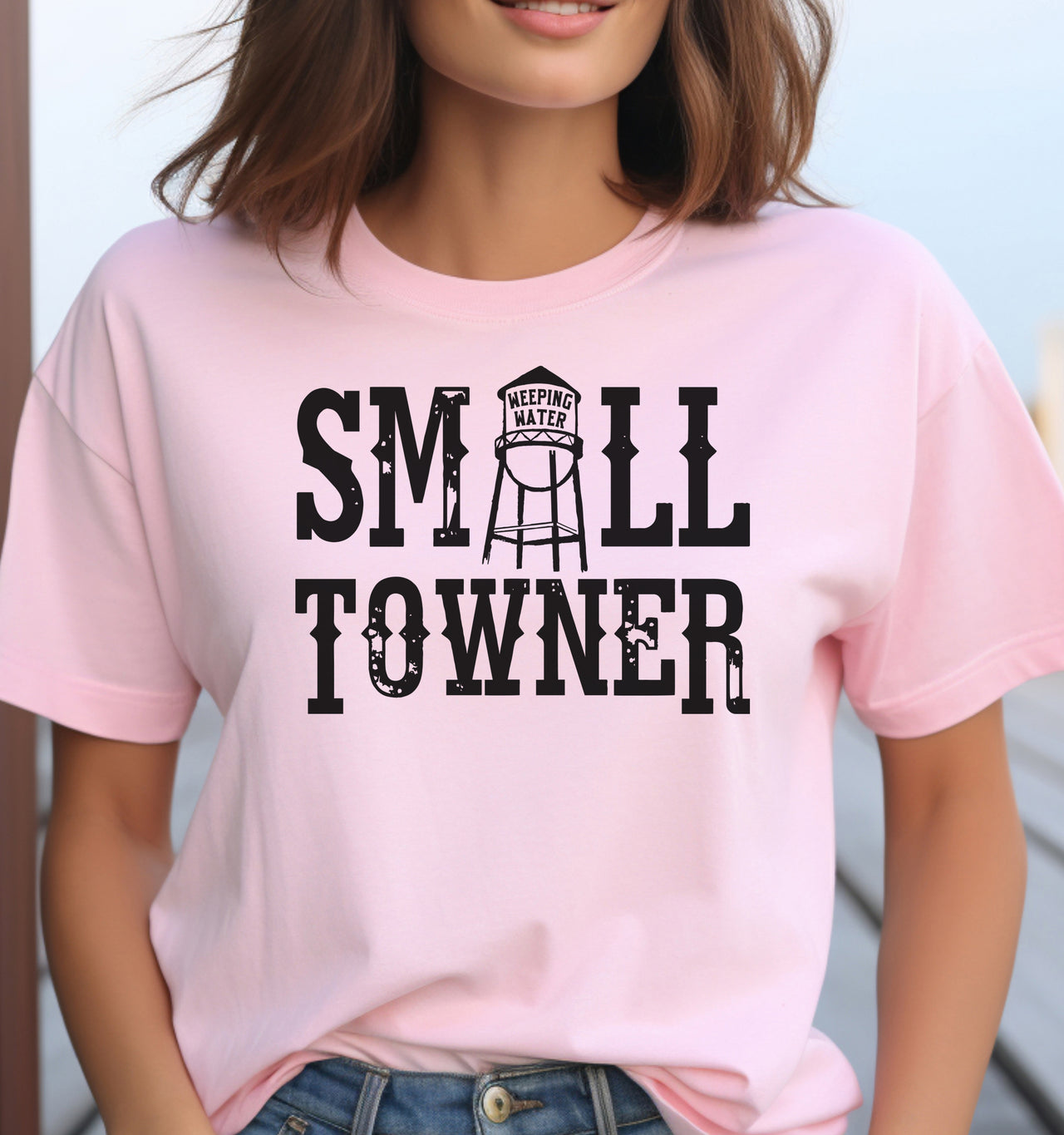 Small Towner Nebraska customizable small town adult unisex cotton tee in pink featuring vintage water tower graphic